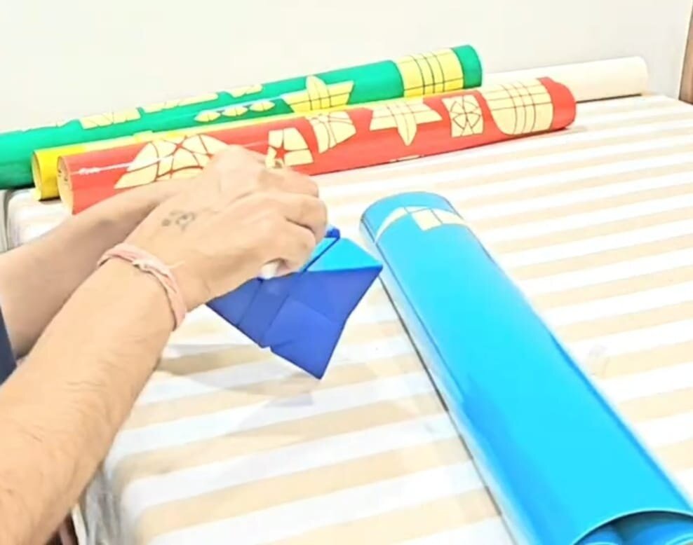 The Making 4 Testing sticker colours against rolls of coloured vinyl